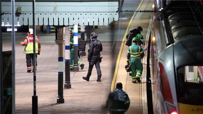 Bilder des Tages Rettungskräfte arbeiten auf dem Bahnsteig des Bahnhofs Huntingdon in England, nachdem mehrere Personen niedergestochen worden waren.