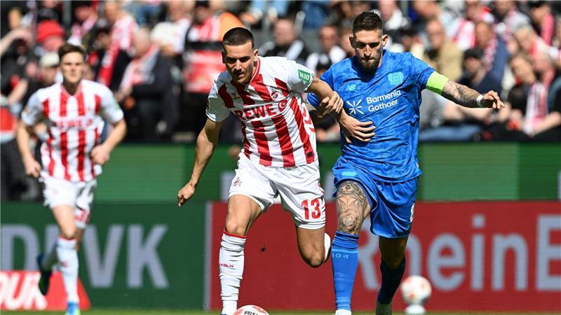Rivalen am Rhein: Kölns Said El Mala (l) und Robert Andrich von Bayer Leverkusen.