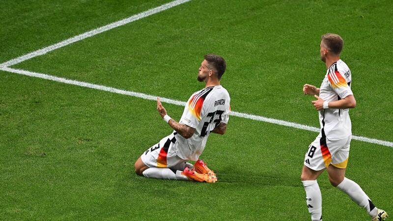 „Ein Knackpunkt“: Füllkrug rettet DFB-Elf Gruppensieg Robert Andrich (l) jubelte zu früh: Sein Fernschusstor wurde wegen eines vorhergegangenen Fouls aberkannt.