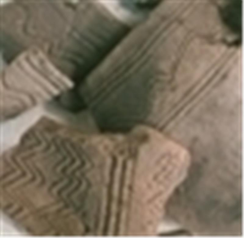 Sächsische Scherben mit slawischen Mustern aus der Alten Burg.