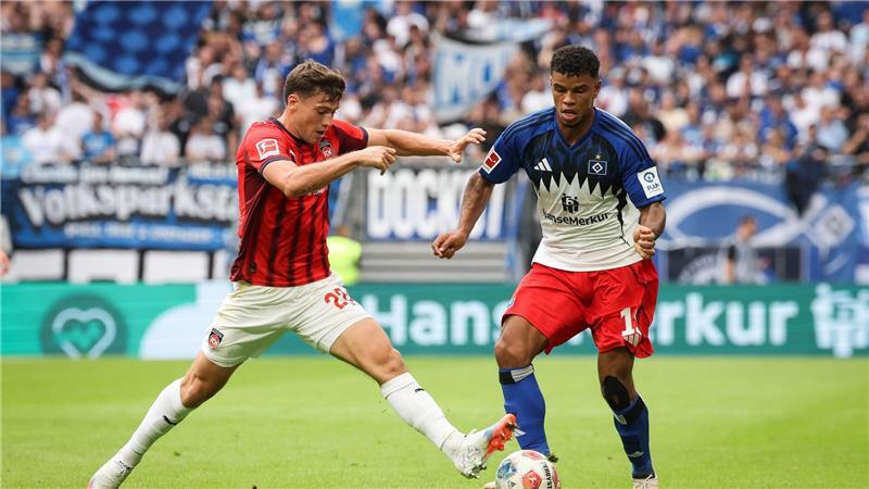 HSV atmet auf: Erster Bundesliga-Sieg seit dem Aufstieg Sorgte für Heidenheim immer wieder für Gefahr: Luca Kerber (l).