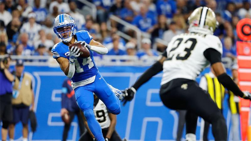 St. Brown (links) erzielte im ersten Saisonspiel zwei Touchdowns für die Lions.