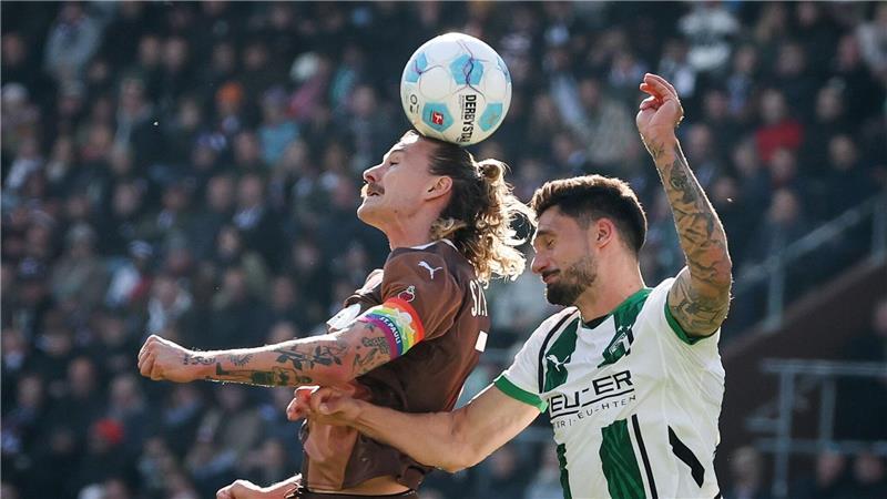 St. Pauli: Ein Remis, das „extreme Energie“ freisetzen soll St. Paulis Jackson Irvine (l) und Mönchengladbachs Tim Kleindienst im Kampf um den Ball.