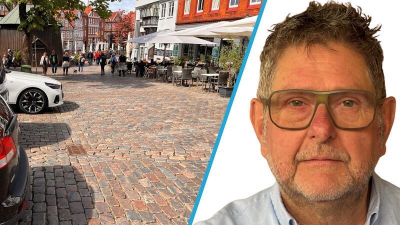Stören das historische Stadtbild: Autos, die zwischen Alter Stadtwaage und Holzkran abgestellt werden.