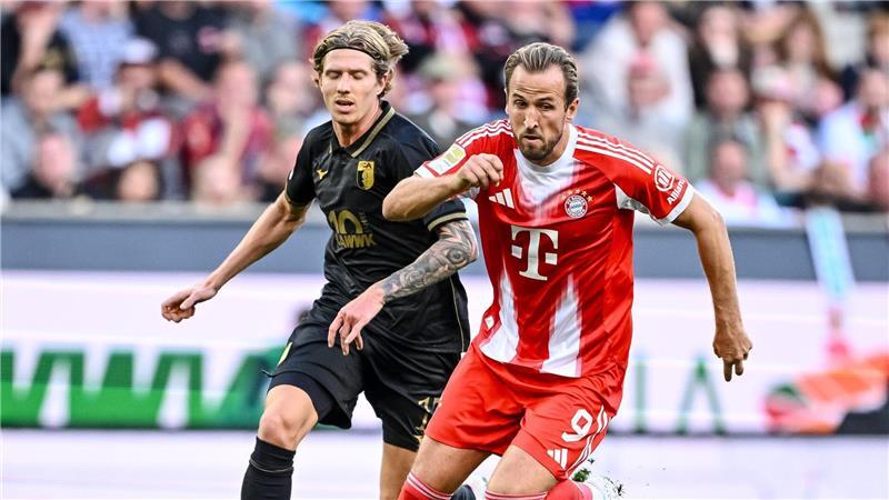 „Nicht perfekt“: Bayern bezwingen Wagners Augsburger Torjäger Harry Kane traf 100. Pflichtspiel für die Bayern nicht selbst, legte aber zwei Treffer auf.