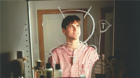 Truman Burbank - dargestellt von Jim Carrey - wird rund um die Uhr für eine Realityshow von Kameras beobachtet.