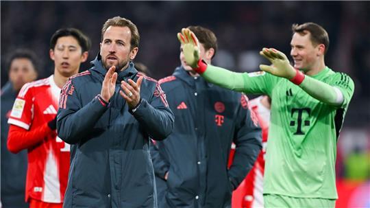 Verlängern sie beim FC Bayern? Harry Kane (l) und Manuel Neuer (r). (Archivbild)