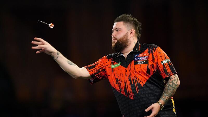 WM-Titelverteidiger Michael Smith schied bei der Weltmeisterschaft aus.